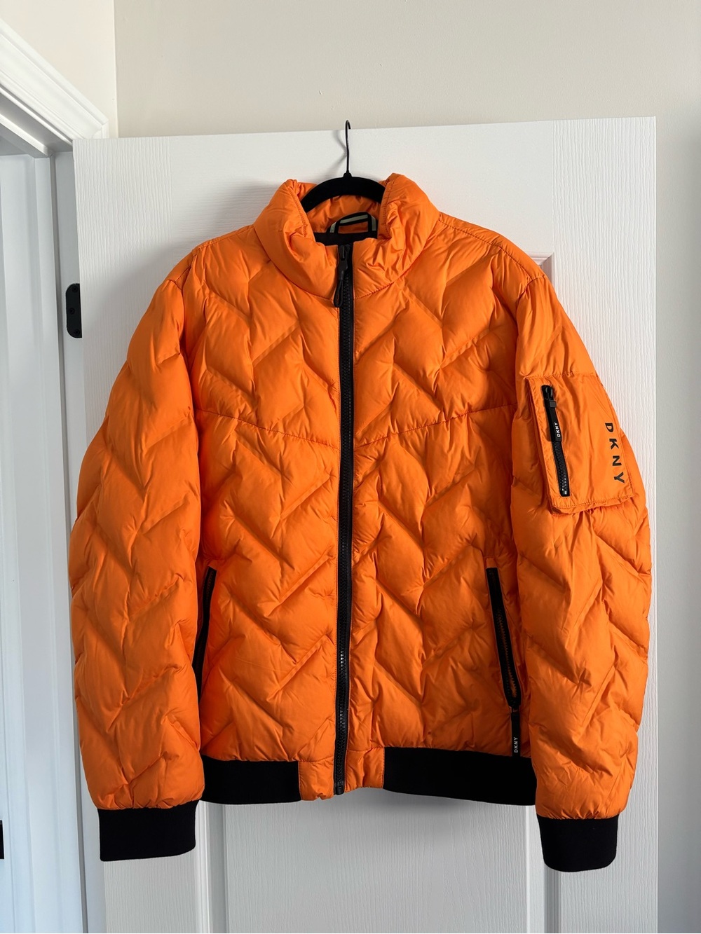 DKNY Men's Orange Quilted Puffer Jacket with Black Trim